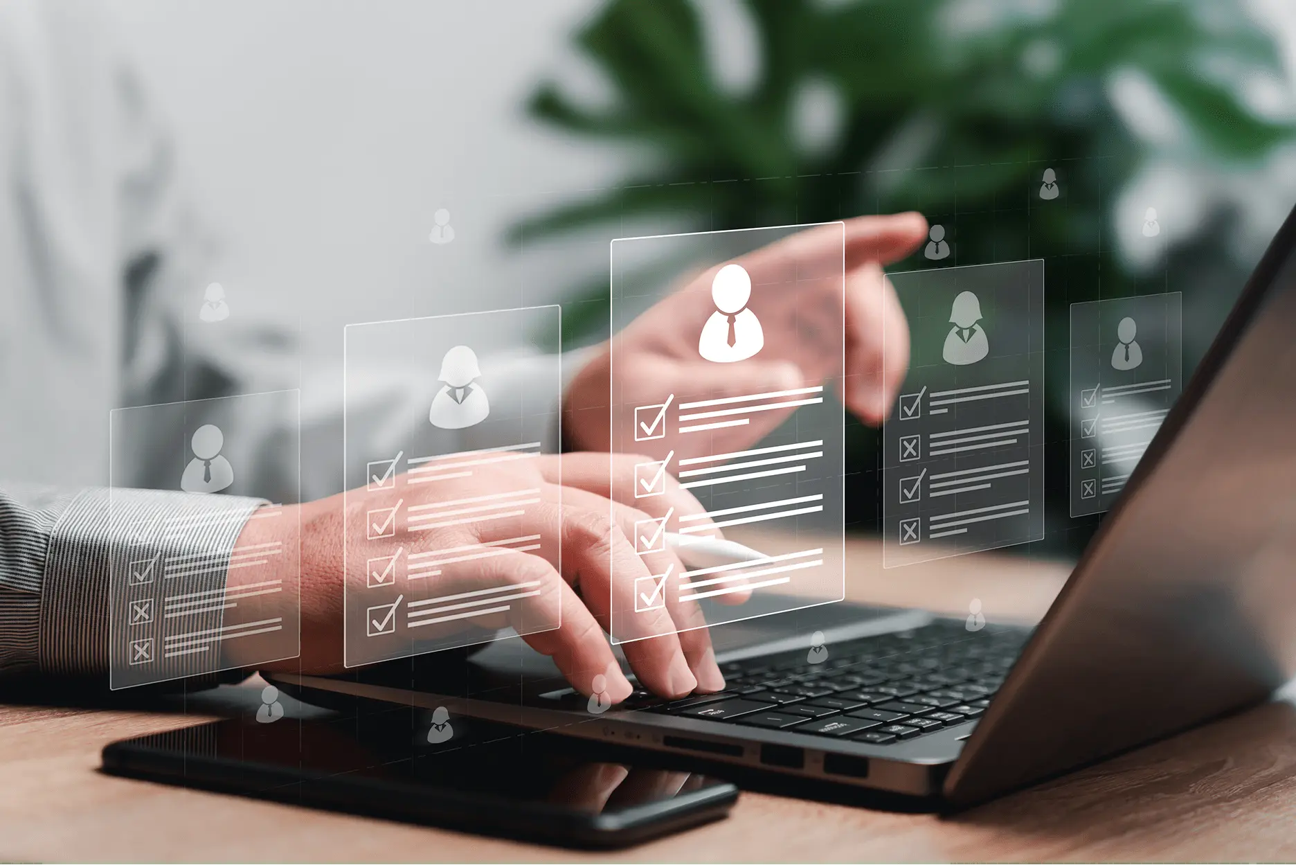 A recruiter using their laptop and artificial intelligence to recruit.